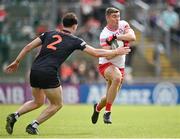 2 June 2024; Ciaran McFaul of Derry in action against Barry McCambridge of Armagh during the GAA Football All-Ireland Senior Championship Round 2 match between Derry and Armagh at Celtic Park in Derry. Photo by Seb Daly/Sportsfile