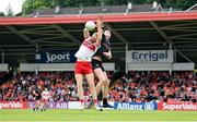 2 June 2024; Conor Glass of Derry in action against Ben Crealey of Armagh during the GAA Football All-Ireland Senior Championship Round 2 match between Derry and Armagh at Celtic Park in Derry. Photo by Seb Daly/Sportsfile
