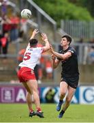 2 June 2024; Ben Crealey of Armagh in action against Conor Doherty of Derry during the GAA Football All-Ireland Senior Championship Round 2 match between Derry and Armagh at Celtic Park in Derry. Photo by Seb Daly/Sportsfile