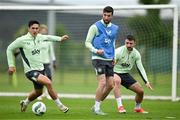 3 June 2024; Finn Azaz, centre, with Jamie McGrath, left, and Mikey Johnston during a Republic of Ireland training session at the FAI National Training Centre in Abbotstown, Dublin. Photo by Brendan Moran/Sportsfile
