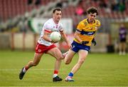 2 June 2024; Darragh Canavan of Tyrone in action against Manus Doherty of Clare during the GAA Football All-Ireland Senior Championship Round 2 match between Tyrone and Clare at O'Neill's Healy Park in Omagh, Tyrone. Photo by Oliver McVeigh/Sportsfile