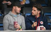3 June 2024; Ruairi Keating of St Patrick's Athletic, right, with former Cork City teammate Kevin O'Connor during the SSE Airtricity Men's Premier Division match between St Patrick's Athletic and Dundalk at Richmond Park in Dublin. Photo by Ramsey Cardy/Sportsfile