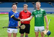 2 June 2024; Referee James Judge with the two captains, Johnny Casey of Longford and Ryan Bogue of Fermanagh before the Lory Meagher Cup final match between Fermanagh and Longford at Croke Park in Dublin. Photo by Ray McManus/Sportsfile