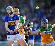 1 June 2024; Oisín O’Donoghue of Tipperary is tackled by James Mahon of Offaly during the oneills.com GAA Hurling All-Ireland U20 Championship final match between Offaly and Tipperary at UPMC Nowlan Park in Kilkenny. Photo by Ray McManus/Sportsfile