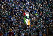 1 June 2024; Offaly supporters, amongst the 25, 825 attendance, wave a Tricolour and the Flag of Palestine before the oneills.com GAA Hurling All-Ireland U20 Championship final match between Offaly and Tipperary at UPMC Nowlan Park in Kilkenny. Photo by Ray McManus/Sportsfile