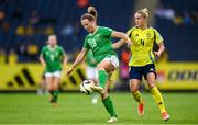 4 June 2024; Kyra Carusa of Republic of Ireland in action against Hanna Lundkvist of Sweden during the 2025 UEFA Women's European Championship qualifying match between Sweden and Republic of Ireland at Friends Arena in Stockholm, Sweden. Photo by Stephen McCarthy/Sportsfile