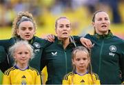 4 June 2024; Republic of Ireland players, from left, Leanne Kiernan, Lily Agg and Kyra Carusa before the 2025 UEFA Women's European Championship qualifying match between Sweden and Republic of Ireland at Friends Arena in Stockholm, Sweden. Photo by Stephen McCarthy/Sportsfile