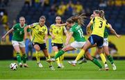 4 June 2024; Kyra Carusa of Republic of Ireland is tackled by Linda Sembrant of Sweden during the 2025 UEFA Women's European Championship qualifying match between Sweden and Republic of Ireland at Friends Arena in Stockholm, Sweden. Photo by Stephen McCarthy/Sportsfile