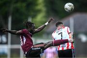7 June 2024; Jeanno Esua of Galway United in action against Michael Duffy of Derry City during the SSE Airtricity Men's Premier Division match between Derry City and Galway United at The Ryan McBride Brandywell Stadium in Derry. Photo by Ramsey Cardy/Sportsfile