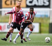 7 June 2024; Sadou Diallo of Derry City evades the tackle of Aodh Dervin of Galway United during the SSE Airtricity Men's Premier Division match between Derry City and Galway United at The Ryan McBride Brandywell Stadium in Derry. Photo by Ramsey Cardy/Sportsfile