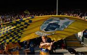 14 September 2013; A Clare supporter waves a flag during the game. Bord Gáis Energy GAA Hurling Under 21 All-Ireland 'A' Championship Final, Antrim v Clare, Semple Stadium, Thurles, Co. Tipperary. Picture credit: Ray McManus / SPORTSFILE