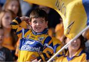 14 September 2013; A young Clare supporter watches the game. Bord Gáis Energy GAA Hurling Under 21 All-Ireland 'A' Championship Final, Antrim v Clare, Semple Stadium, Thurles, Co. Tipperary. Picture credit: Ray McManus / SPORTSFILE