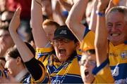 14 September 2013; Clare supporters celebrate a score during the game. Bord Gáis Energy GAA Hurling Under 21 All-Ireland 'A' Championship Final, Antrim v Clare, Semple Stadium, Thurles, Co. Tipperary. Picture credit: Ray McManus / SPORTSFILE