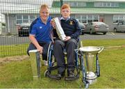 19 September 2013; Pictured at the official launch of Leinster Rugby’s Bank of Ireland Treble Trophy Tour at Newbridge Post Primary School, Co. Kildare, are Jamie Byrne, and Leinster academy player and local Newbridge lad, James Tracy. Schools interested in turning their school Leinster Blue and receiving a visit from the treble trophies, the Amlin Challenge Cup, RaboDirect PRO12, British and Irish Cup should email - trophy@leinsterrugby.ie. Supported by Bank of Ireland, Newbridge Post Primary School, was the first school to receive the three trophies on their provincial tour which continues throughout the school year. Leinster fans can keep up to date by following @leinstertrophytour on Twitter or at www.Facebook.com/leinsterrugbytrophytour! Newbridge Post Primary School, Newbridge, Co. Kildare. Picture credit: Barry Cregg / SPORTSFILE