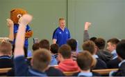 19 September 2013; Pictured at the official launch of Leinster Rugby’s Bank of Ireland Treble Trophy Tour at Newbridge Post Primary School, Co. Kildare, is Leinster academy player and local Newbridge lad James Tracy as he answers questions from the children of the school. Schools interested in turning their school Leinster Blue and receiving a visit from the treble trophies, the Amlin Challenge Cup, RaboDirect PRO12, British and Irish Cup should email - trophy@leinsterrugby.ie. Supported by Bank of Ireland, Newbridge Post Primary School, was the first school to receive the three trophies on their provincial tour which continues throughout the school year. Leinster fans can keep up to date by following @leinstertrophytour on Twitter or at www.Facebook.com/leinsterrugbytrophytour! Newbridge Post Primary School, Newbridge, Co. Kildare. Picture credit: Barry Cregg / SPORTSFILE