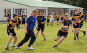 19 September 2013; Pictured taking part in a game of tag rugby with the students at the official launch of Leinster Rugby’s Bank of Ireland Treble Trophy Tour at Newbridge Post Primary School, Co. Kildare, is Leinster academy player and local Newbridge lad James Tracy. Schools interested in turning their school Leinster Blue and receiving a visit from the treble trophies, the Amlin Challenge Cup, RaboDirect PRO12, British and Irish Cup should email - trophy@leinsterrugby.ie. Supported by Bank of Ireland, Newbridge Post Primary School, was the first school to receive the three trophies on their provincial tour which continues throughout the school year. Leinster fans can keep up to date by following @leinstertrophytour on Twitter or at www.Facebook.com/leinsterrugbytrophytour! Newbridge Post Primary School, Newbridge, Co. Kildare. Picture credit: Barry Cregg / SPORTSFILE