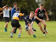 19 September 2013; Students take part in a game of tag rugby at the official launch of Leinster Rugby’s Bank of Ireland Treble Trophy Tour at Newbridge Post Primary School, Co. Kildare. Schools interested in turning their school Leinster Blue and receiving a visit from the treble trophies, the Amlin Challenge Cup, RaboDirect PRO12, British and Irish Cup should email - trophy@leinsterrugby.ie. Supported by Bank of Ireland, Newbridge Post Primary School, was the first school to receive the three trophies on their provincial tour which continues throughout the school year. Leinster fans can keep up to date by following @leinstertrophytour on Twitter or at www.Facebook.com/leinsterrugbytrophytour! Newbridge Post Primary School, Newbridge, Co. Kildare. Picture credit: Barry Cregg / SPORTSFILE