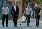 19 September 2013; Fermanagh footballer Tommy McElroy, left, and Kerry footballer Darran O’Sullivan,right,  pictured with Ronan Moran, Dublin Area Manager from Ulster Bank, and Newstalk 106-108 fm’s Off the Ball presenter, Ger Gilroy, with the Sam Maguire cup  in advance of the live broadcast of Ireland’s most popular sports radio show ‘Off the Ball’ at Vicar Street, Dublin on Thursday 19th September. The ‘Off The Ball Roadshow with Ulster Bank’, which has already been to Donegal, Kerry, Mayo and Cork will give GAA fans the opportunity to experience the multi award-winning show, where they will broadcast live from GAA haunts and clubs across the country. As part of their sponsorship of the GAA Football All-Ireland Senior Championship, Ulster Bank is, once again, giving GAA clubs across the country the opportunity to win support packages for their clubs. Ulster Bank GAA Force gives GAA clubs the opportunity to refurbish and upgrade their facilities, where one lucky GAA club will receive the top award of a support package worth €25,000. Four runners-up (one from each province) will also receive a support package worth €5,000. GAA clubs can enter Ulster Bank GAA Force at www.ulsterbank.com/gaa until Friday 20th September. Vicar Street, Dublin. Picture credit: Matt Browne / SPORTSFILE