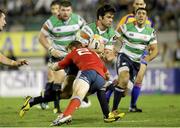 20 September 2013; Luke McLean, Benetton Treviso, is tackled by JJ Hanrahan, Munster. Celtic League 2013/14, Round 3, Benetton Treviso v Munster, Stadio Monigo, Treviso, Italy. Picture credit: Roberto Bregani / SPORTSFILE