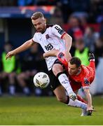 7 June 2024; Paul Doyle of Dundalk in action against Liam Burt of Shelbourne during the SSE Airtricity Men's Premier Division match between Shelbourne and Dundalk at Tolka Park in Dublin. Photo by Seb Daly/Sportsfile