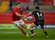 7 June 2024; Seán O'Brien of Munster is tackled by Luke Morgan of Ospreys during the United Rugby Championship quarter-final match between Munster and Ospreys at Thomond Park in Limerick. Photo by Brendan Moran/Sportsfile