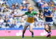 8 June 2024; Cillian Kiely of Offaly in action against Tomás Keyes of Laois during the Joe McDonagh Cup final match between Laois and Offaly at Croke Park in Dublin. Photo by John Sheridan/Sportsfile