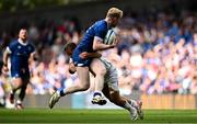 8 June 2024; Jamie Osborne of Leinster is tackled by Stewart Moore of Ulster during the United Rugby Championship quarter-final match between Leinster and Ulster at the Aviva Stadium in Dublin. Photo by Harry Murphy/Sportsfile
