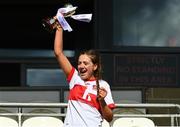 8 June 2024; Derry captiain Karen Birt lifts the cup after the 2024 All-Ireland U14 Gold Final match between Armagh and Derry at BOX-IT Athletic Grounds in Armagh. Photo by Tyler Miller/Sportsfile