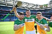 8 June 2024; Offaly players, from left, Eimhín Kelly, Brian Duignan and Luke Watkins celebrate after their side's victory in the Joe McDonagh Cup final match between Laois and Offaly at Croke Park in Dublin. Photo by Piaras Ó Mídheach/Sportsfile