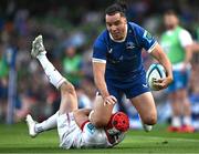 8 June 2024; James Lowe of Leinster is tackled by Mike Lowry of Ulster during the United Rugby Championship quarter-final match between Leinster and Ulster at the Aviva Stadium in Dublin. Photo by Harry Murphy/Sportsfile