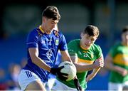 8 June 2024; Patrick O Keane of Wicklow in action against Jack Gilheany of Leitrim during the Tailteann Cup preliminary quarter-final match between Leitrim and Wicklow at Glennon Brothers Pearse Park in Longford. Photo by Stephen Marken/Sportsfile