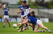9 June 2024; Evan O’Carroll of Laois is tackled by Cian O'Dea of New York during the Tailteann Cup preliminary quarter-final match between Laois and New York at Laois Hire O'Moore Park in Portlaoise, Laois. Photo by Tom Beary/Sportsfile