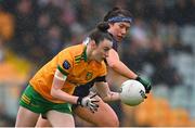 9 June 2024; Roisin Rodgers of Donegal in action against Emma Dineen of Kerry during the TG4 All-Ireland Ladies Football Senior Championship Round 1 match between Donegal and Kerry at MacCumhaill Park in Ballybofey, Donegal. Photo by Ben McShane/Sportsfile