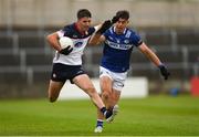 9 June 2024; Shane Brosnan of New York is tackled by Seamus Lacey of Laois during the Tailteann Cup preliminary quarter-final match between Laois and New York at Laois Hire O'Moore Park in Portlaoise, Laois. Photo by Tom Beary/Sportsfile