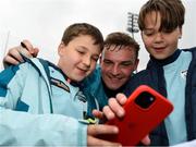 9 June 2024; Laois goalkeeper Killian Roche takes a selfie with young supporters after the Tailteann Cup preliminary quarter-final match between Laois and New York at Laois Hire O'Moore Park in Portlaoise, Laois. Photo by Tom Beary/Sportsfile