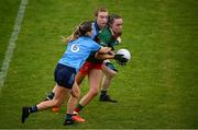 9 June 2024; Maria Cannon of Mayo in action against Dublin players Martha Byrne, left, and Lauren Magee, behind, during the TG4 All-Ireland Ladies Football Senior Championship Round 1 match between Dublin and Mayo at Parnell Park in Dublin. Photo by Seb Daly/Sportsfile