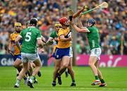 9 June 2024; Peter Duggan of Clare is tackled by David Reidy of Limerick during the Munster GAA Hurling Senior Championship final match between Clare and Limerick at FBD Semple Stadium in Thurles, Tipperary. Photo by Brendan Moran/Sportsfile