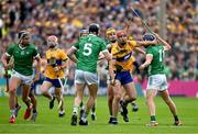 9 June 2024; Peter Duggan of Clare is tackled by David Reidy of Limerick during the Munster GAA Hurling Senior Championship final match between Clare and Limerick at FBD Semple Stadium in Thurles, Tipperary. Photo by Brendan Moran/Sportsfile