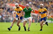 9 June 2024; Shane O'Brien of Limerick in action against Conor Cleary of Clare during the Munster GAA Hurling Senior Championship final match between Clare and Limerick at FBD Semple Stadium in Thurles, Tipperary. Photo by Brendan Moran/Sportsfile