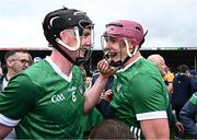 9 June 2024; Limerick players Declan Hannon, left, and Shane O'Brien celebrate after their side's victory in the Munster GAA Hurling Senior Championship final match between Clare and Limerick at FBD Semple Stadium in Thurles, Tipperary. Photo by Piaras Ó Mídheach/Sportsfile