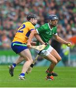 9 June 2024;David Reidy of Limerick in action against Tony Kelly of Clare during the Munster GAA Hurling Senior Championship final match between Clare and Limerick at FBD Semple Stadium in Thurles, Tipperary. Photo by John Sheridan/Sportsfile