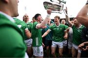 9 June 2024; Limerick captain Declan Hannon and teammates, including Conor Boylan and Cian Lynch, celebrate with the Mick Mackey cup after the Munster GAA Hurling Senior Championship final match between Clare and Limerick at FBD Semple Stadium in Thurles, Tipperary. Photo by Brendan Moran/Sportsfile