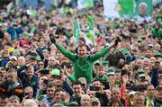 9 June 2024; Limerick supporters celebrate after the Munster GAA Hurling Senior Championship final match between Clare and Limerick at FBD Semple Stadium in Thurles, Tipperary. Photo by Brendan Moran/Sportsfile