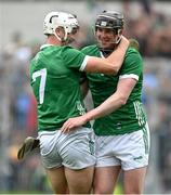 9 June 2024; Limerick players, from left, Kyle Hayes and Declan Hannon celebrate at the final whistle of the Munster GAA Hurling Senior Championship final match between Clare and Limerick at FBD Semple Stadium in Thurles, Tipperary. Photo by Brendan Moran/Sportsfile
