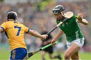 9 June 2024; Gearóid Hegarty of Limerick is tackled by David McInerney of Clare during the Munster GAA Hurling Senior Championship final match between Clare and Limerick at FBD Semple Stadium in Thurles, Tipperary. Photo by Brendan Moran/Sportsfile