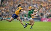9 June 2024; Shane O'Brien of Limerick in action against Cathal Malone of Clare during the Munster GAA Hurling Senior Championship final match between Clare and Limerick at FBD Semple Stadium in Thurles, Tipperary. Photo by Brendan Moran/Sportsfile