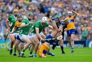 9 June 2024; Mark Rodgers of Clare is tackled by Kyle Hayes of Limerick during the Munster GAA Hurling Senior Championship final match between Clare and Limerick at FBD Semple Stadium in Thurles, Tipperary. Photo by Ray McManus/Sportsfile
