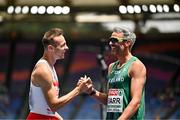10 June 2024; Thomas Barr of Ireland, right, with Arpad Banoczy of Hungary after their men's 400m hurdles semi-final during day four of the 2024 European Athletics Championships at the Stadio Olimpico in Rome, Italy. Photo by Sam Barnes/Sportsfile