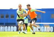 10 June 2024; Mikey Johnston and Mark Sykes, left, during a Republic of Ireland training session at Estádio de São Miguel in Gondomar, Portugal. Photo by Stephen McCarthy/Sportsfile