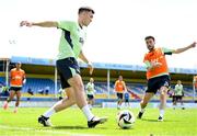 10 June 2024; Dara O'Shea and Mikey Johnston, right, during a Republic of Ireland training session at Estádio de São Miguel in Gondomar, Portugal. Photo by Stephen McCarthy/Sportsfile